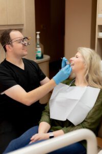 Spring, TX dentist Dr. Smith with a patient during an interview