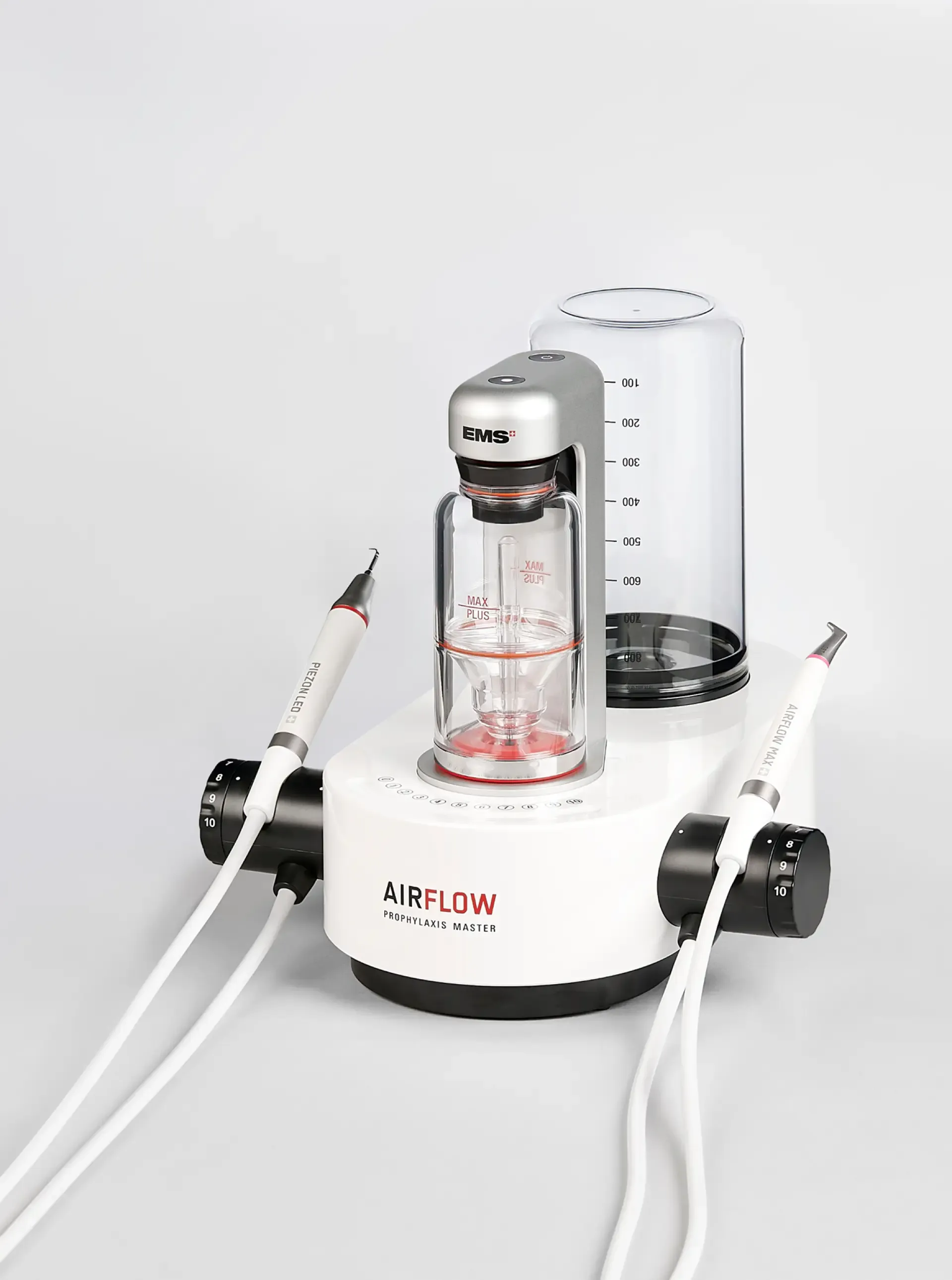 The EMS AIRFLOW Prophylaxis Master unit with its Piezon and AIRFLOW handpieces