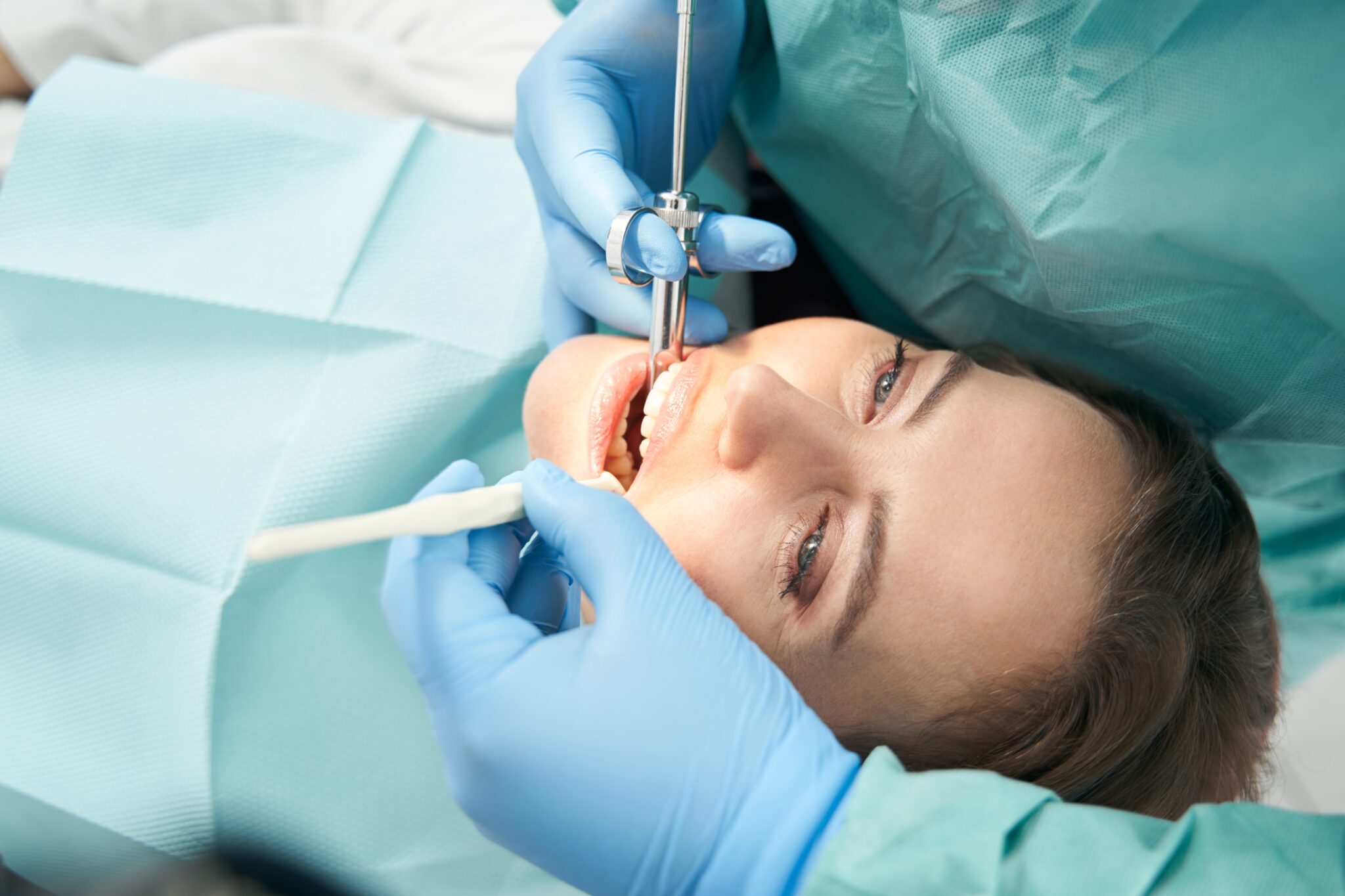 young woman undergoing root canal treatment