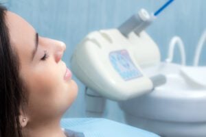 close up of a young woman calm in a dental chair, dental sedation