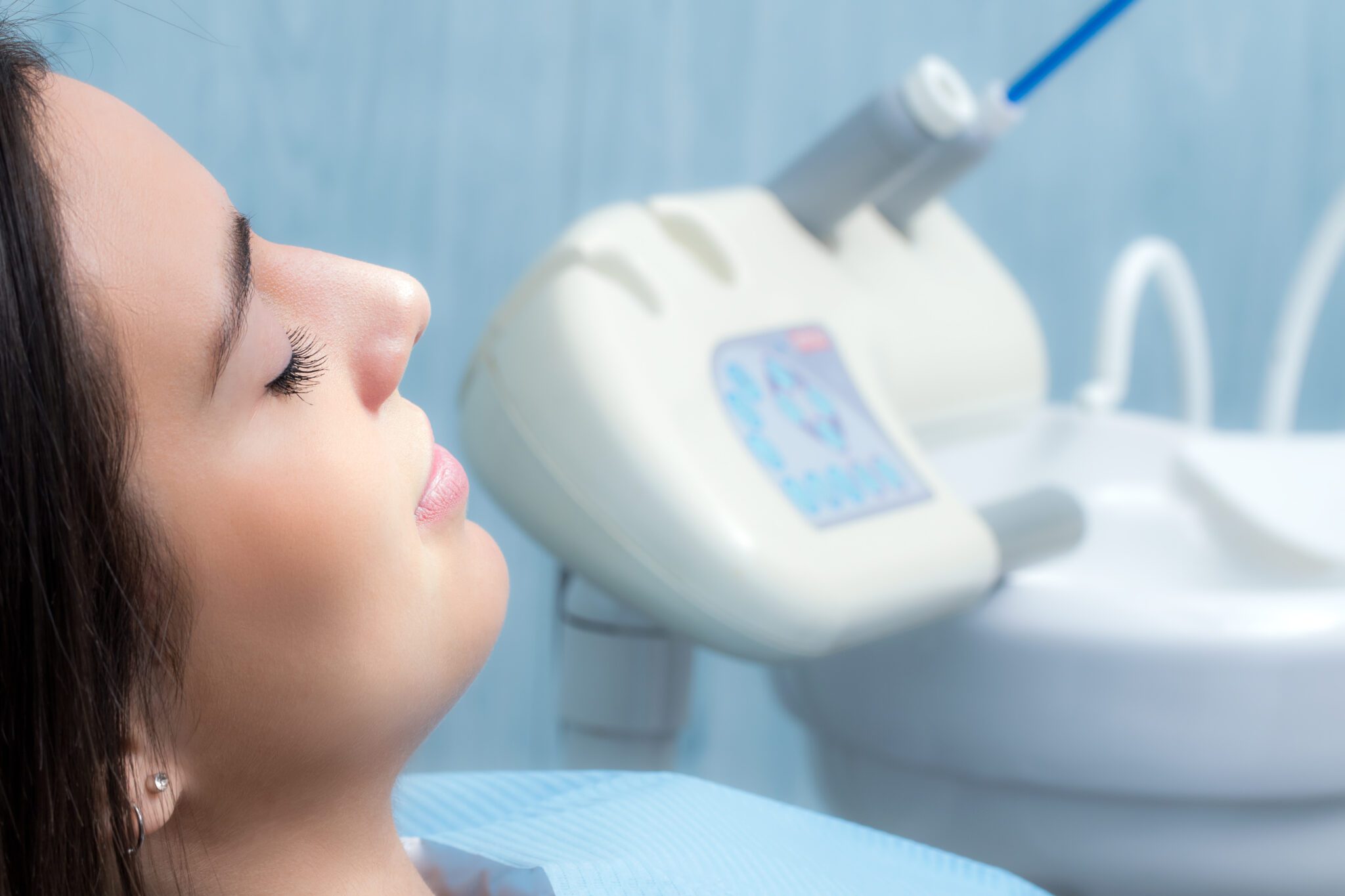 close up of a young woman calm in a dental chair, dental sedation